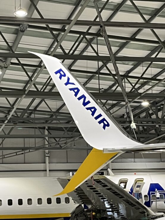a tail of an airplane in a building