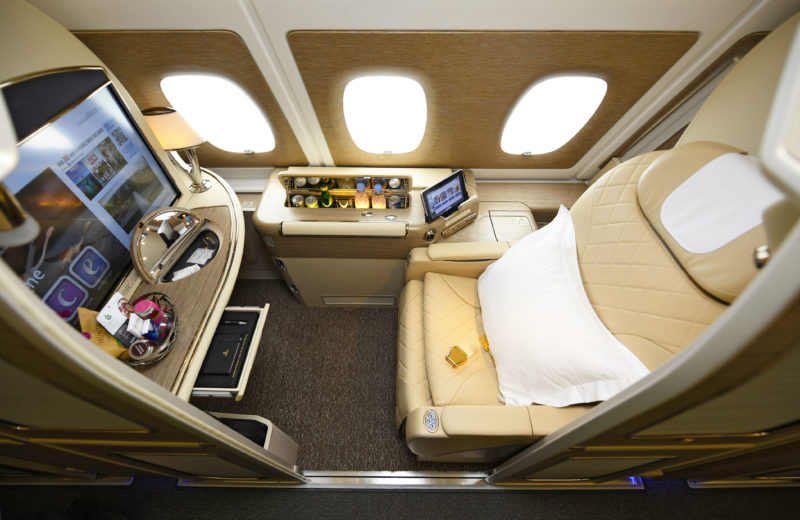 an airplane with a bed and a table