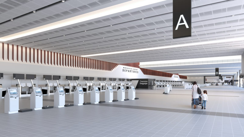 a large airport terminal with white machines