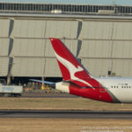 the tail of an airplane on a runway