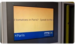 a screen with a yellow and blue sign