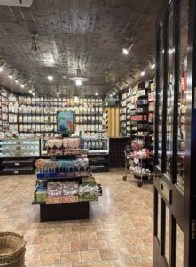 a store with shelves of food and candy