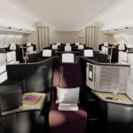 a interior of a plane with rows of seats