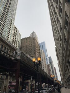 a train on a bridge over a city