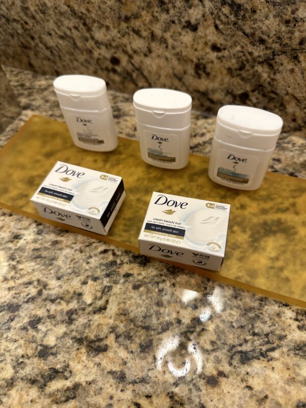 a group of white containers on a counter