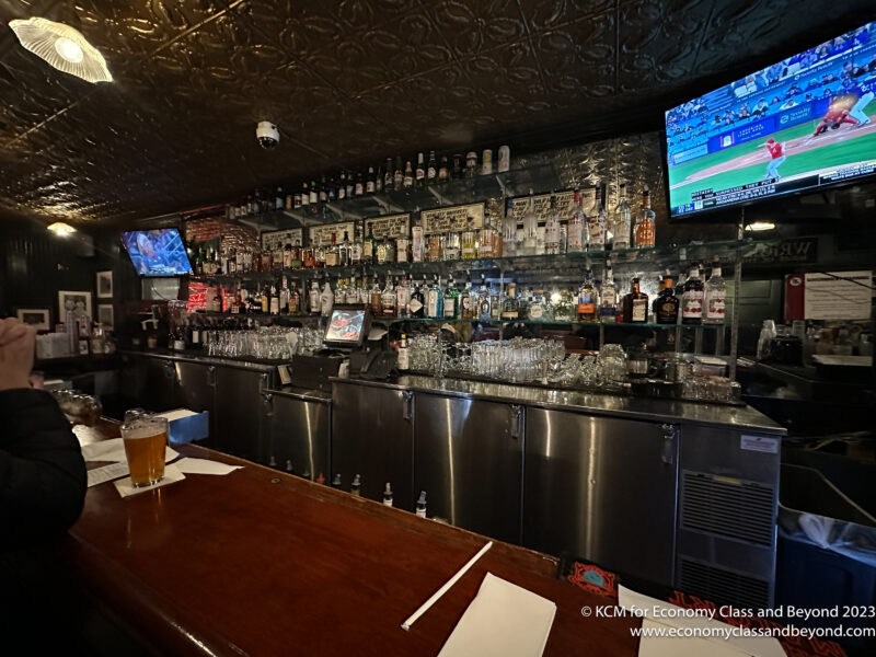 a bar with a bar and a television