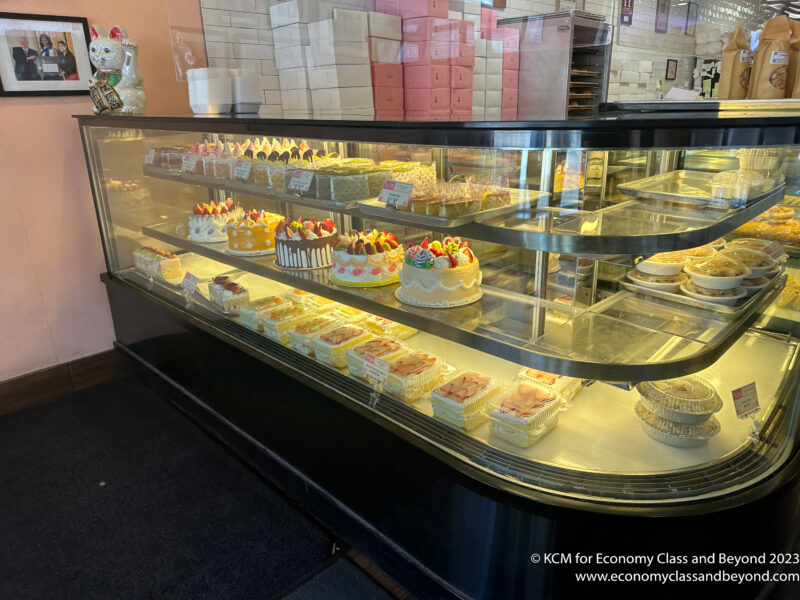 a display case with cakes on it