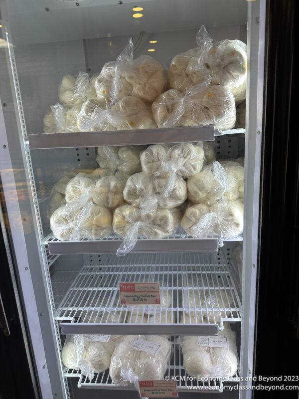 a refrigerator with bags of food