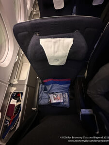 a seat with a bag on it