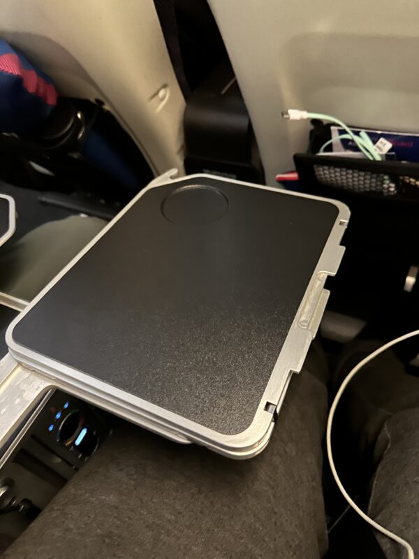 a stack of electronic devices in a car