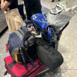 a group of luggage on a cart