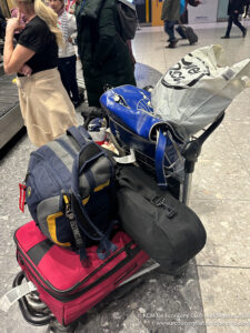 a group of luggage on a cart
