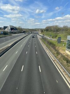 a highway with cars on it