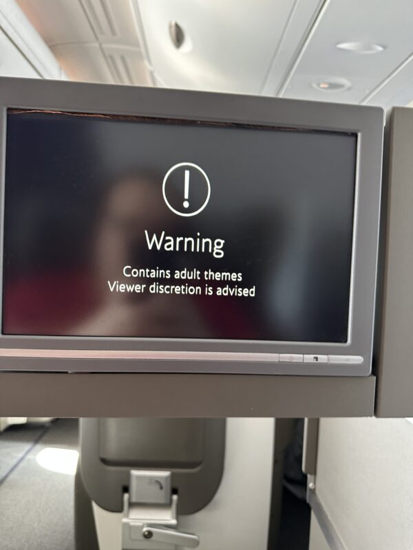 a screen with a warning sign
