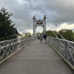 a bridge with people walking on it
