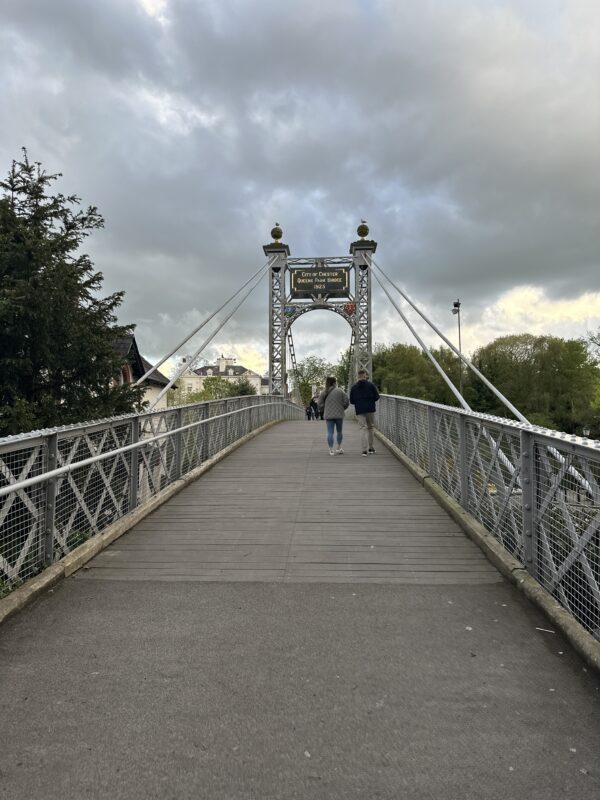 a bridge with people walking on it