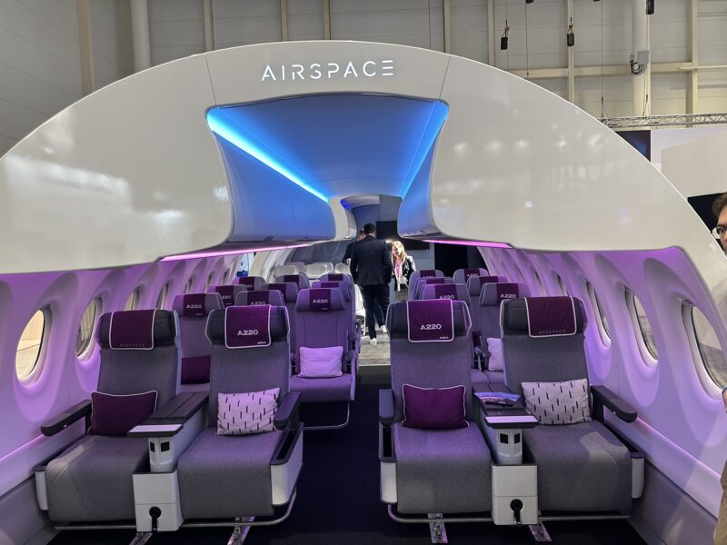 a plane with purple seats