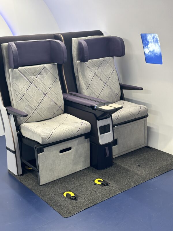 a pair of seats in a plane