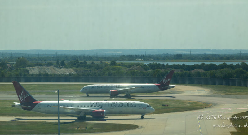 two airplanes on a runway