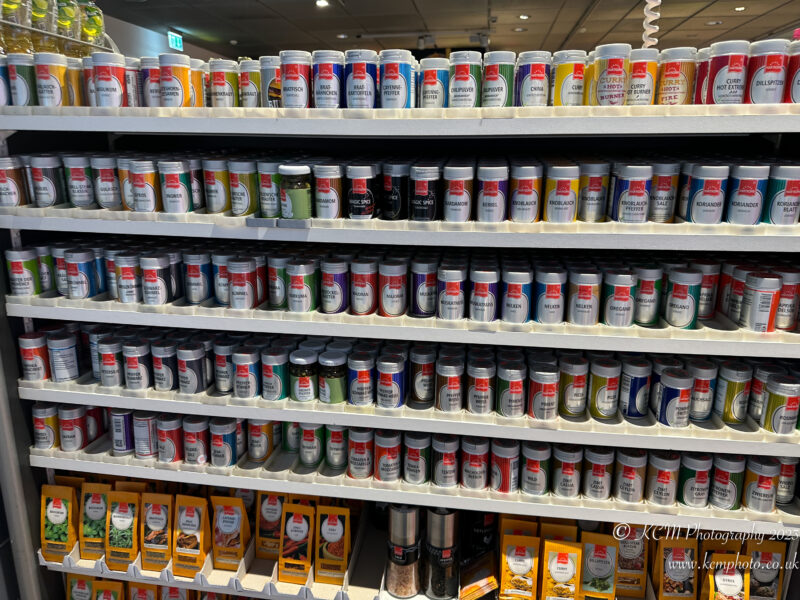 a shelf with many containers on it