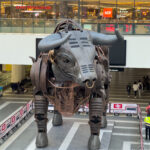 a bull statue in a mall