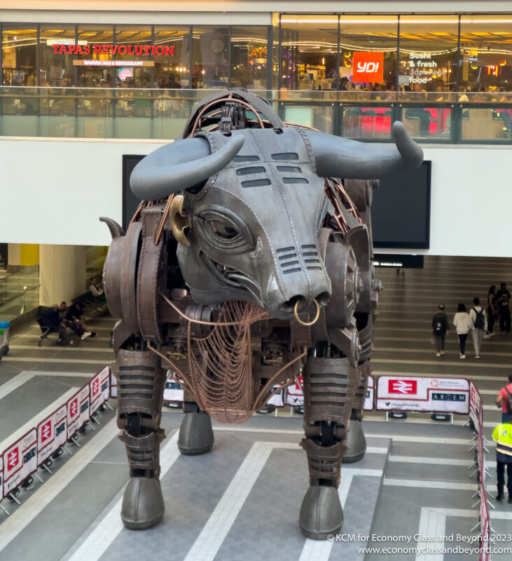 a bull statue in a mall