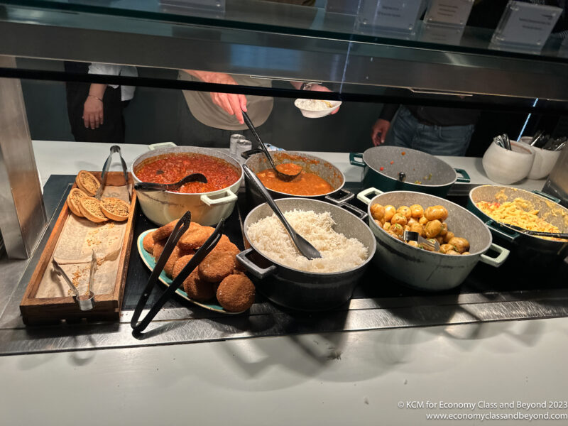a buffet with food in bowls