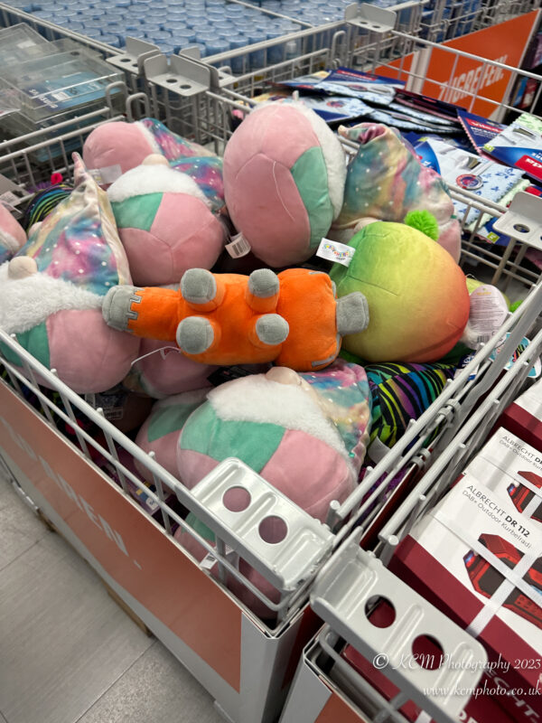 a basket of stuffed animals