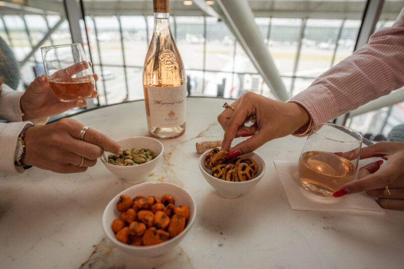 a group of people eating and drinking