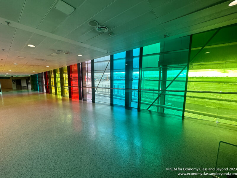 a colorful glass wall in a building