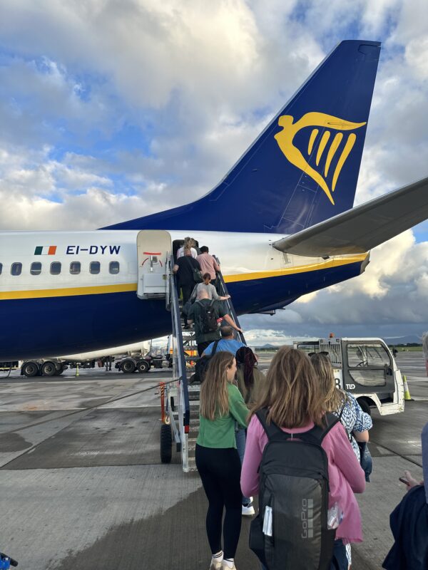 people boarding an airplane