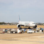 American Airlines Boeing 777-300ER pushing back at London Heathrow - Image, Economy Class and Beyond