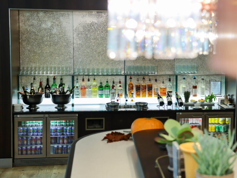 a bar with bottles of alcohol