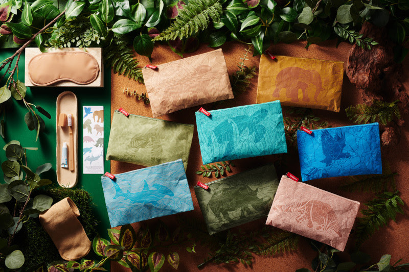 a group of colorful bags and a toothbrush