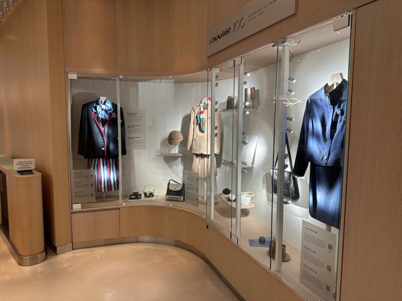 a display case with clothes on it