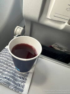 a cup of liquid on a tray