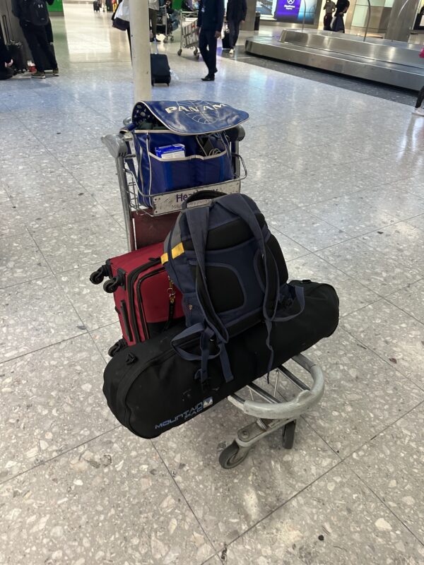 luggage on a cart in a airport