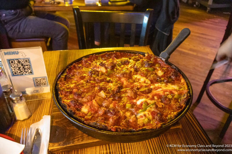a pizza in a pan on a table
