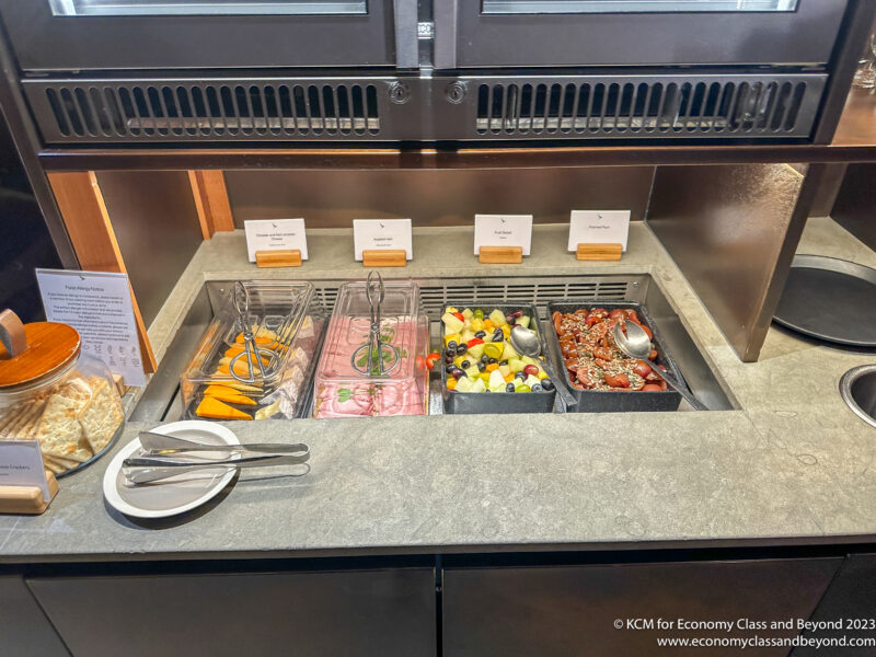 a trays of food in a counter