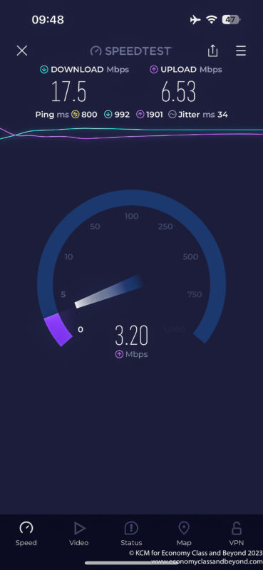 a speedometer with a blue and white stripe