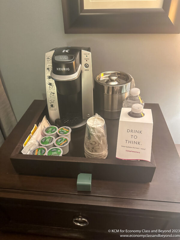 a coffee machine and other items on a table