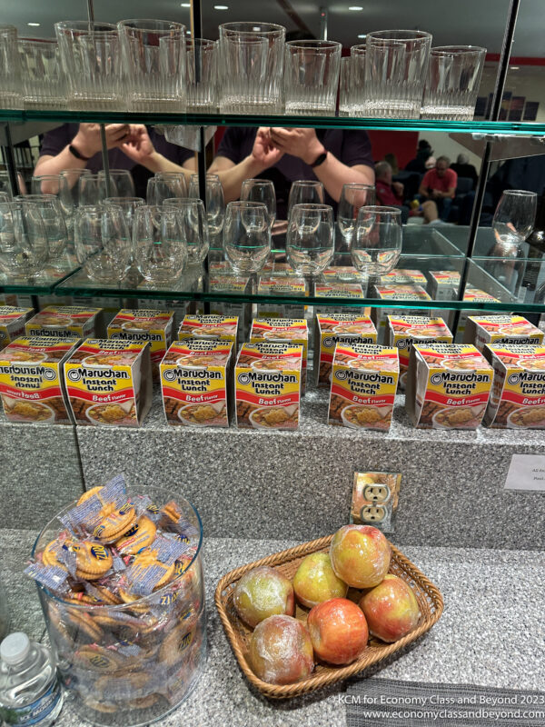 a display of glasses and snacks
