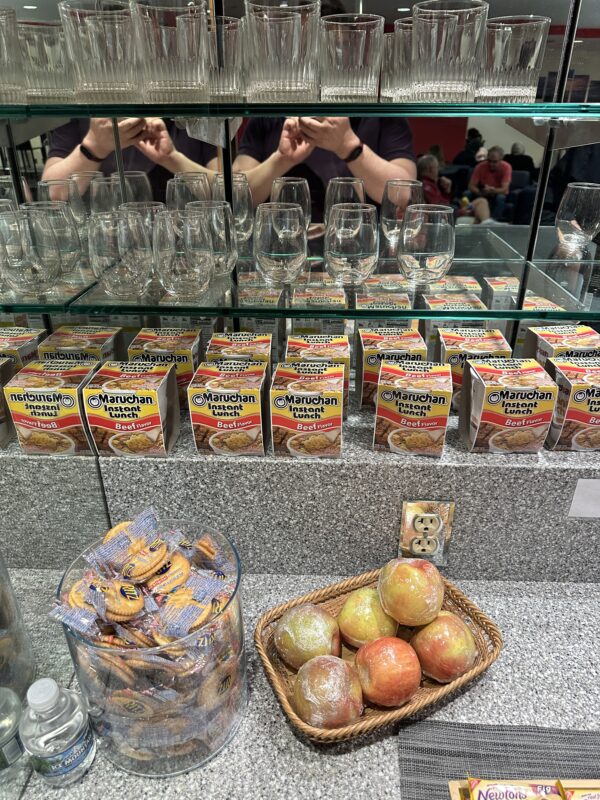 a display of glasses and snacks