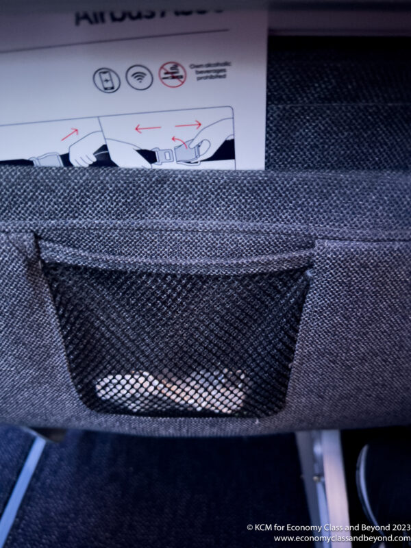 a black mesh pocket on a seat
