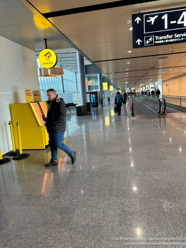 a man walking in a terminal
