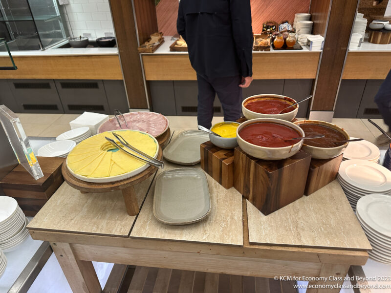 a table with different bowls of food