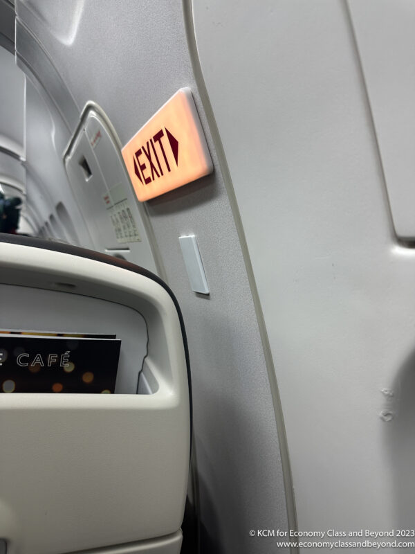 an exit sign on an airplane
