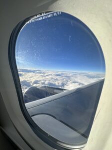 a view of clouds from an airplane window