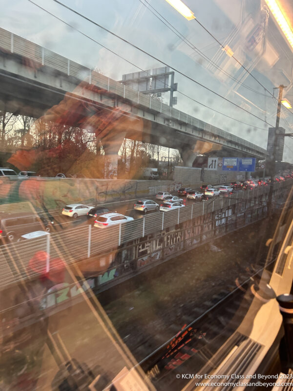 a view of a traffic jam from a train window