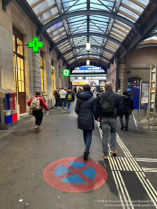 people walking in a tunnel